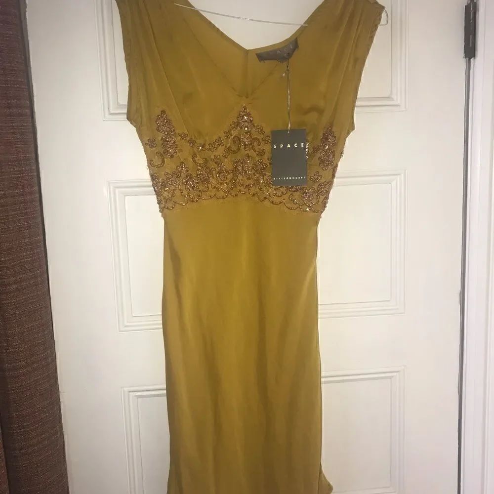 Space style concept designer dress size S